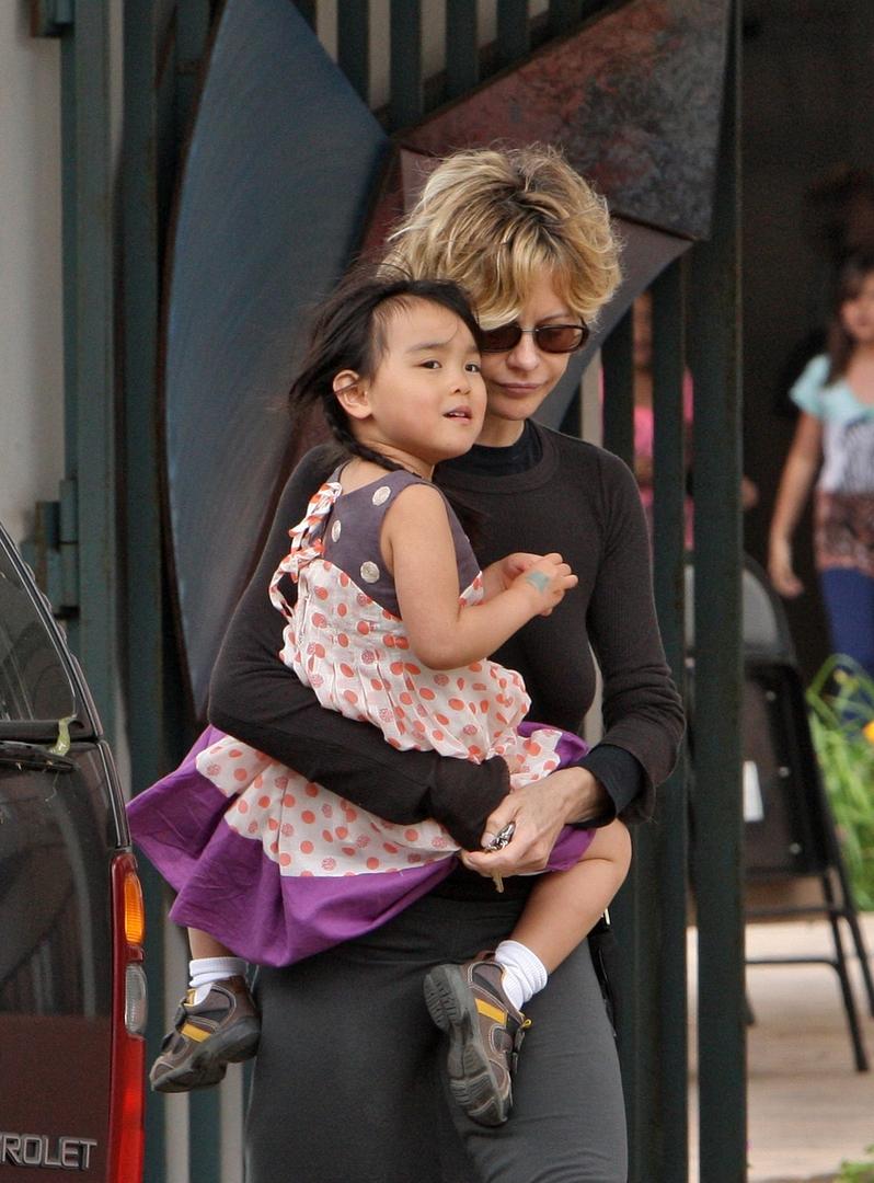 Мег с дочкой в 2009 году