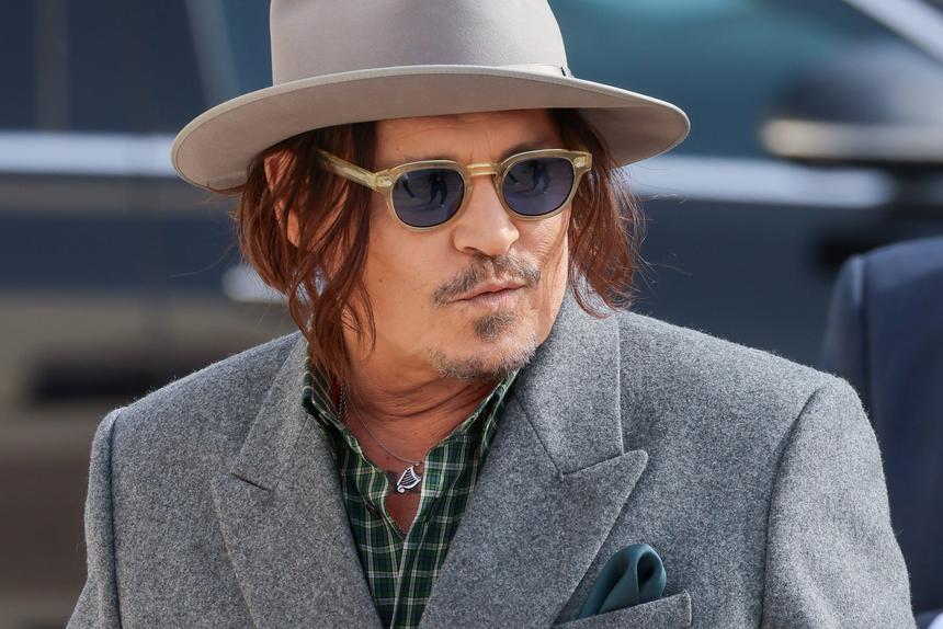 Шарлиз Терон оскорбила Джонни Деппа на Неделе моды в Париже